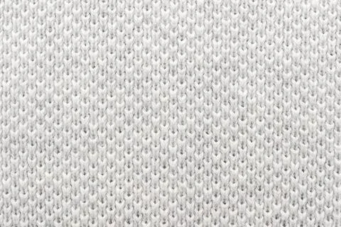 Texture of white material or fabric with interlaced lines in the shape of r.. Stock Photos
