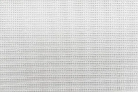 Texture of a white mesh silicone mat. Silicone material background. Net Stock Photos