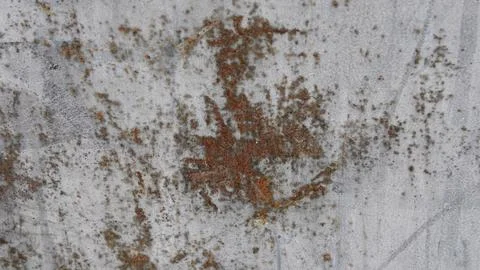 Texture of a white metal sheet with rust in the centre Stock Photos