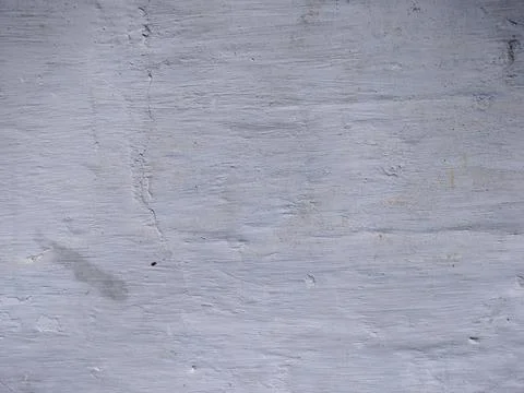 Texture of white plaster on a concrete wall handmade. Old White Wall Texture. Stock Photos
