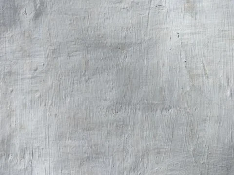 Texture of white plaster on a concrete wall handmade. Old White Wall Texture. Stock Photos