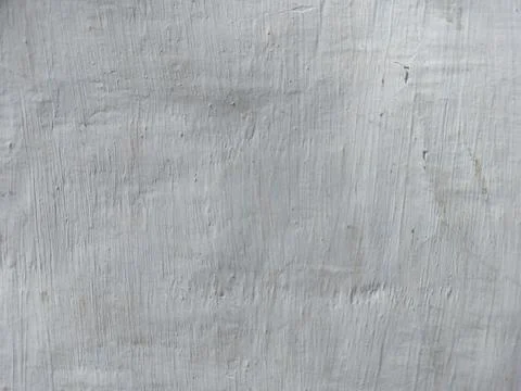 Texture of white plaster on a concrete wall handmade. Old White Wall Texture. Stock Photos