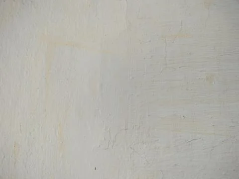 Texture of white plaster on a concrete wall handmade. Old White Wall Texture. Stock Photos