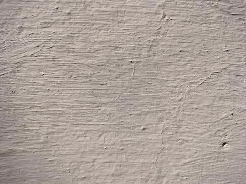 Texture of white plaster on a concrete wall handmade. Old White Wall Texture. Stock Photos