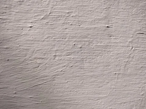 Texture of white plaster on a concrete wall handmade. Old White Wall Texture. Stock Photos