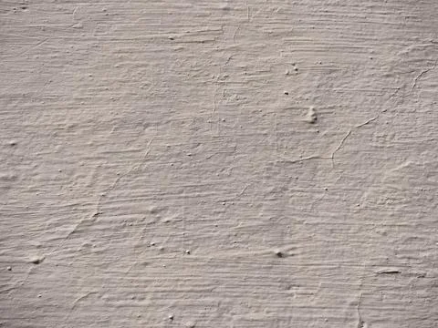 Texture of white plaster on a concrete wall handmade. Old White Wall Texture. Stock Photos