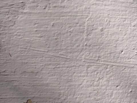 Texture of white plaster on a concrete wall handmade. Old White Wall Texture. Stock Photos