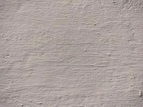 Texture of white plaster on a concrete wall handmade. Old White Wall Texture. Stock Photos
