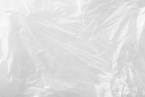 Texture of white plastic bag as background, closeup Photos