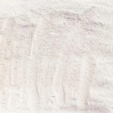 Texture of white sand beach for background Stock Photos