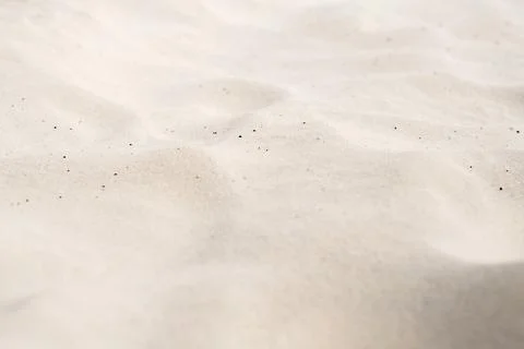 The texture of white sand in perspective. Stock Photos