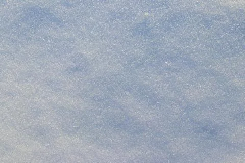 Texture of the white snow. Winter background Stock Photos