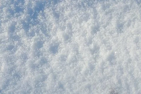 Texture of the white snow. Winter background Stock Photos