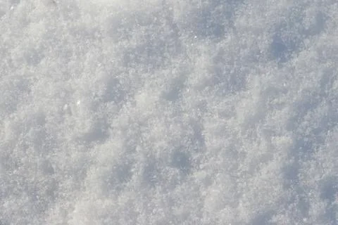 Texture of the white snow. Winter background Stock Photos