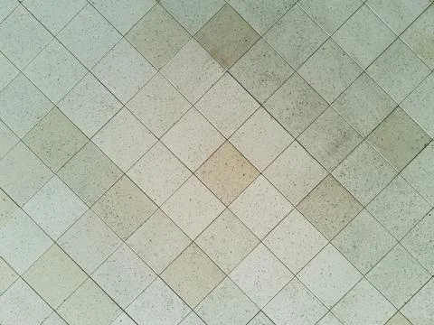 Texture of white square suspended ceiling slabs. Stock Photos