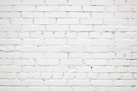 Texture of white wall made of old bricks. Surface background with copy space. Fotos de archivo