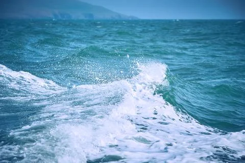 Texture of white wave in the ocean. Stock Photos