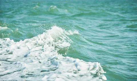 Texture of white wave in the ocean. Stock Photos