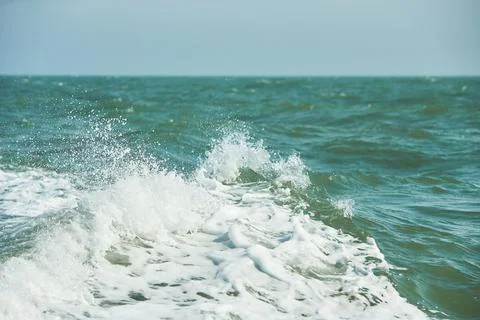 Texture of white wave in the ocean. Stock Photos