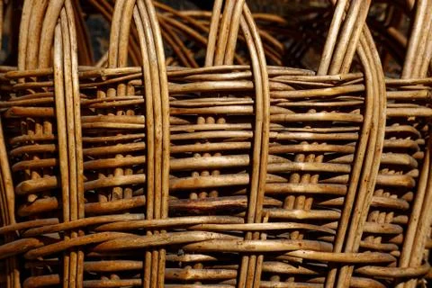 Texture of a wicker basket close-up. Abstract background with a wood pattern. Stock Photos