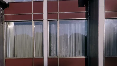 The texture from the windows of the building camera moves smoothly from left to Stock Footage 112628342
