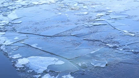 Texture of winter ice with cracks on a river Stock Footage 346764094