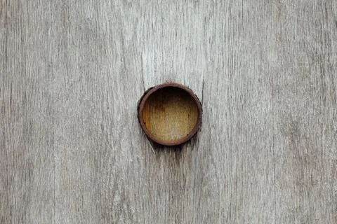Texture of wood with protruding rusty pipe Stock Photos