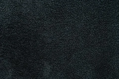 Texture of wool face towel in black soft and fluffy texture Stock Photos