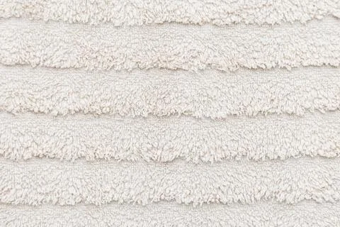 Texture of wool face towel in bright beige soft and fluffy close up Stock Photos