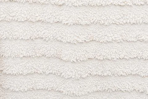 Texture of wool face towel in bright beige soft and fluffy Stock Photos