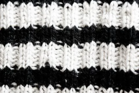 Texture of woolen knitted fabric Stock Photos