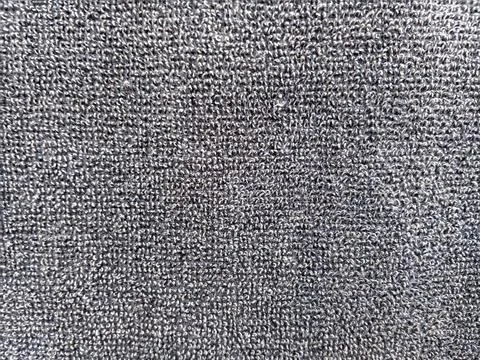 The texture of a worn-out dark blue towel Stock Photos