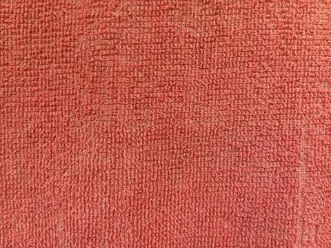 The texture of a worn-out red towel Stock Photos