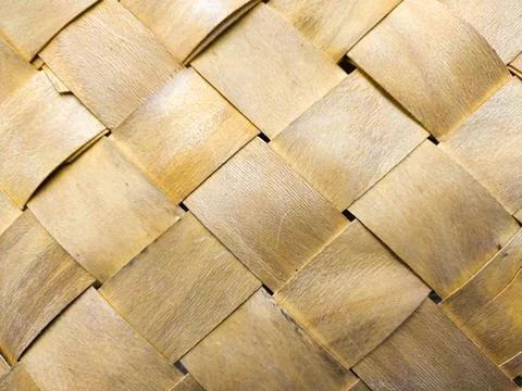 Texture woven from the bark. Birch bark tied with stripes. Handmade for home. Stock-Fotos