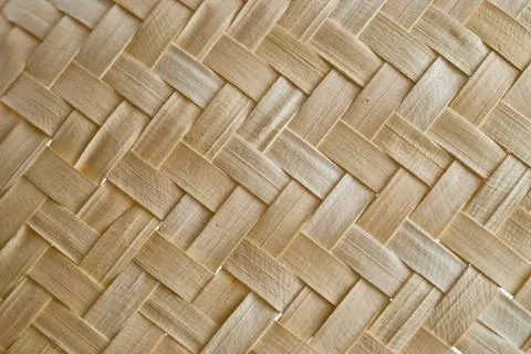 Texture of woven straw. Stock Photos