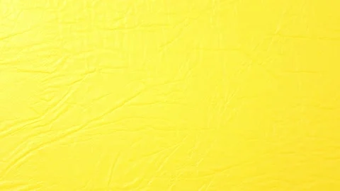 Texture of yallow leather surface, fabric for sewing furniture and products. Stock Footage 136944257