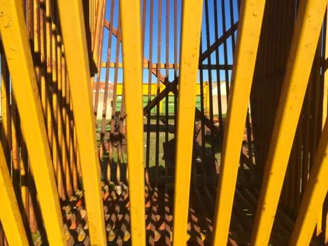 Texture of yellow metallic bars Stock Photos