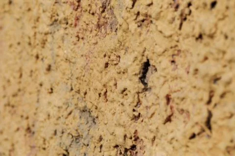 Texture of yellow not flat wall Stock Photos