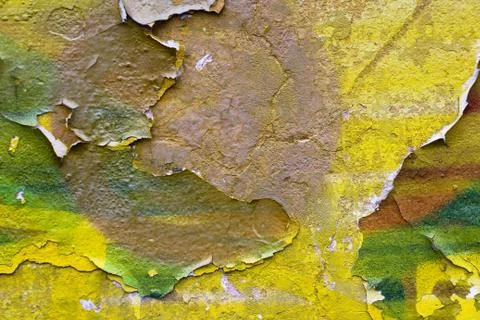 The texture of the yellow paint on the wall. Stock Photos