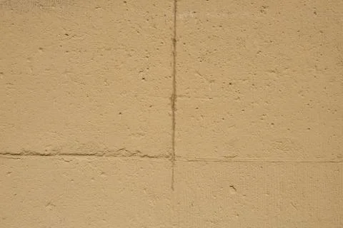 Texture of a yellow wall Stock Photos