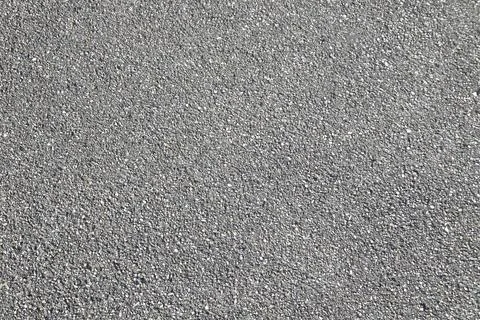Textured Asphalt Road Surface for Construction and Design Background Foto stock