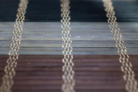 Textured backdrop with string weaved through in blue shades. Stock-Fotos