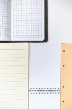 Textured background from blank open notebooks, notes and albums Stock Photos
