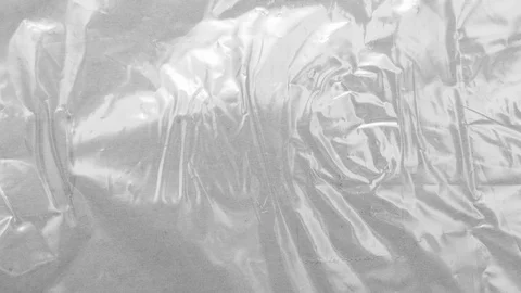Textured background, crumpled transparent polyethylene film Stock Footage 122012246