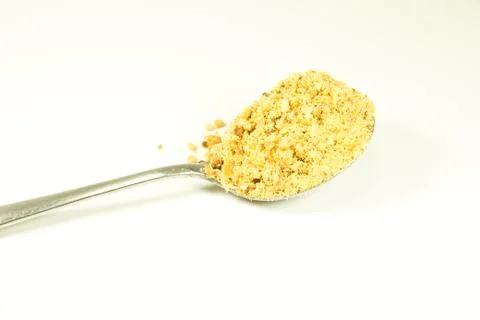 Textured background of crushed peanuts Stock Photos