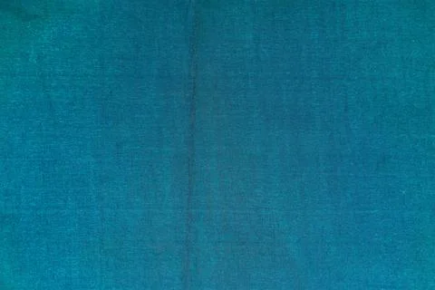 Textured background of fabric and threads, modified color scheme. Illustrazione stock