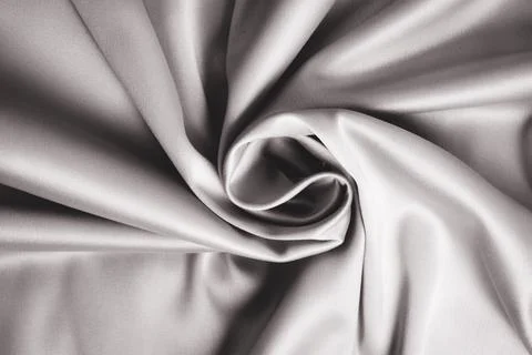Textured background of gray silk or satin. Stock Photos