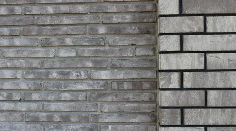Textured background of grey loft-style linear brick 스톡 사진