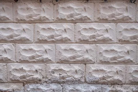 A textured background image of a stone wall Stock Photos