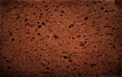 Textured background - macro view of brown sponge Stock Photos